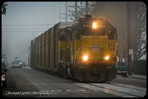 UP 603 leading a south bound Costa Mesa switcher along Olive Street on a foggy morning in March 2007
