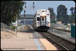 SCAX 604 arrives at the Irvine Transportation Center with a train bound for Los Angeles.