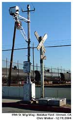 Photo of the wig-wag and it replacement signal. The original was removed illegally by a few over zealous railfans years ago.