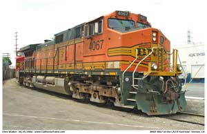 * Another image as the BNSF 4067 crosses Maywood Street on the LAJ A yard lead with the M-BARLAC interchange train.