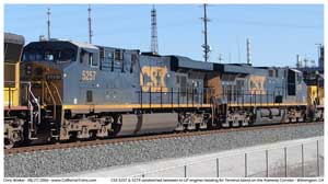 CSX 5257 & CSX 5279 head two Terminal Island sandwiched between some UP engines at CP Long Beach Jct.