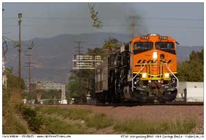 ATSF 3751 pushing BNSF 7744 through Basta in Fullerton, CA