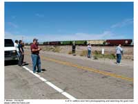 The BNSF engine power for their interchange train MWCLBAR came east along the outside track